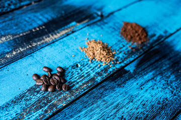 coffee beans ground coffee turkish coffee espresso on top view blue wooden table