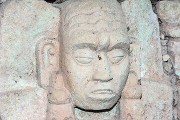 It's Sculpted head stone at Mayan archeological site, Copan Ruins, Honduras, Central America