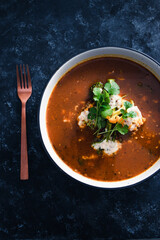 plant-based food, vegan lentil soup with caulini and broccolini and vegan cream cheese topping