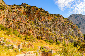 It's Delphi, an archaeological site in Greece, at the Mount Parnassus. Delphi is famous by the oracle at the sanctuary dedicated to Apollo. UNESCO World heritage