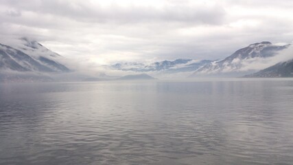 Fototapeta na wymiar Mist in the morning at Lake Como, Italy
