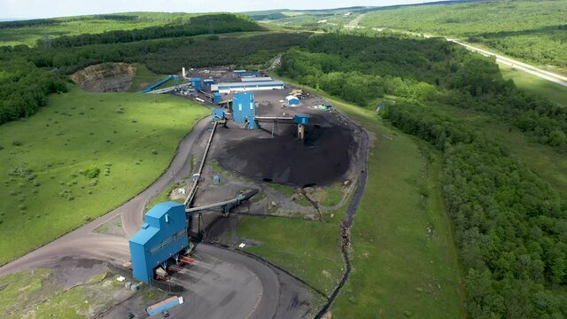 Aerial closeup of coal mining machine tower with elevator for loading coal into trucks in Mount Storm, WV.