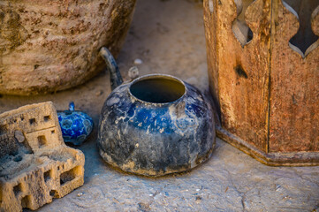 Fototapeta premium It's Old pieces of dishes in Al Qasr, old village in Dakhla Desert, Egypt