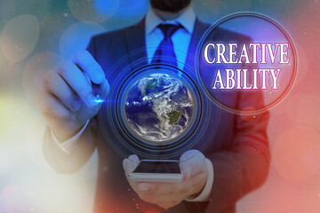 Word writing text Creative Ability. Business photo showcasing power to act freely to show themselves without limitation Elements of this image furnished by NASA