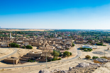Fototapeta premium It's Panoramic view of Al Qasr, old village in Dakhla Desert, Egypt