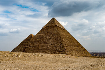 Fototapeta na wymiar It's Ruins of the Great Pyramids at the Giza Necropolis, Giza Plateau, Egypt. UNESCO World Heritage