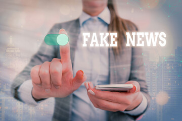Word writing text Fake News. Business photo showcasing false information publish under the guise of...