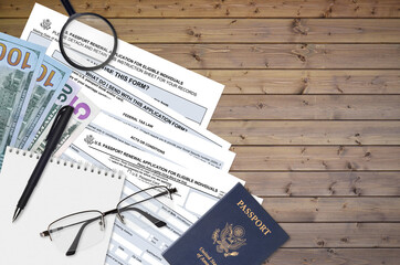 Department of State form DS82 U.S. Passport renewal application for eligible individuals lies on...