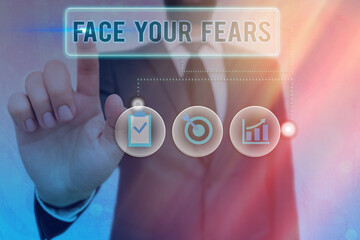 Writing note showing Face Your Fears. Business concept for Strong and confident to look into the...