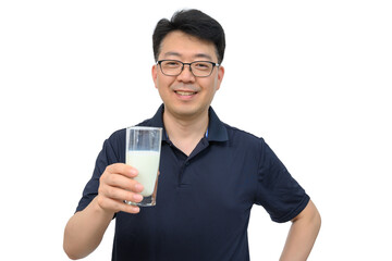 A middle-aged Asian man is drinking a fresh glass of milk on white background.