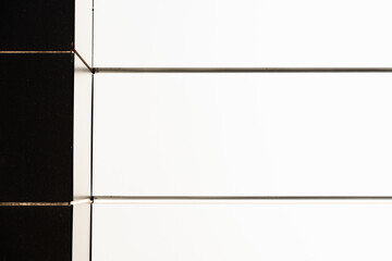 White background with black boards and symmetrical lines to the sun.