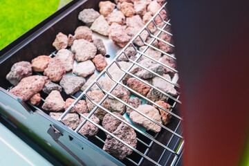 New gas barbecue, brand new, unworn, with volcanic stone grill.