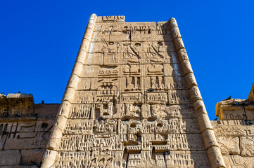 It's Wall of the Medinet Habu (Mortuary Temple of Ramesses III), West Bank of Luxor in Egypt.