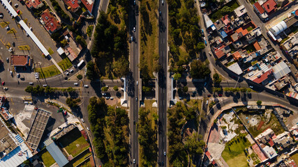 Aerial photography of the magical town of Metepec, State of Mexico, Mexico, where its main roads and overpasses can be seen, photography of symmetrical avenues.
