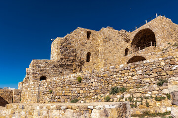 It's Kerak Castle, a large crusader castle in Kerak (Al Karak) in Jordan.