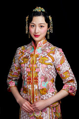 Fototapeta premium Women in Asian red costume on black background