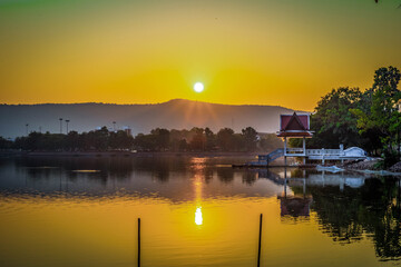 Obraz premium Sunrise over Phu Phan Noi mountain . Nong Bua lake located at the western base of this mountain . Nong Bua lake is the most famous tourist attraction of Nong Bua Lamphu province , Thailand.