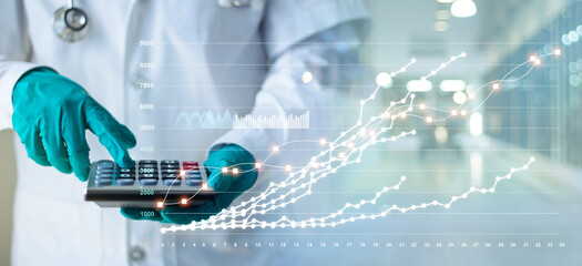 The doctor is using the calculator to calculate the number of patients increasing in the hospital...