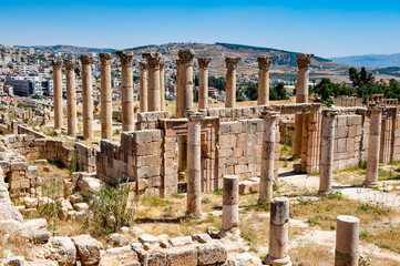 Fototapeta na wymiar It's Columns of the Ancient Roman city of Gerasa of Antiquity , modern Jerash, Jordan