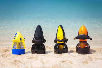 Underwater scooter diving equipment on the beach © thomsond