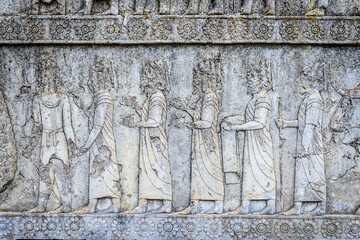 It's Relief of nations bringing tribute, staircase to Apadana. Persepolis, the ceremonial capital of the Achaemenid Empire. UNESCO World Heritage