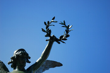 Bronze Statue Holding Laurel Crown