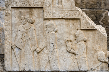 It's Ancient stone relief in Persepolis, the ceremonial capital of the Achaemenid Empire. UNESCO World Heritage