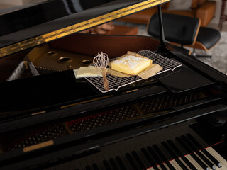 Cheesecake with Patula on top of Piano