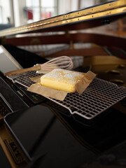 Cheesecake with Patula on top of Piano
