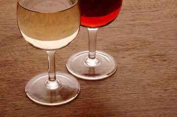 Wine Glasses containing red and white wine