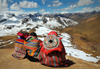 People contemplating the Andes in South America