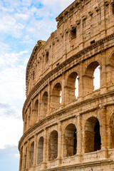 Fototapeta premium It's Colosseum or Coliseum in the evening, Rome, Italy. One of the main touristic destinations in Rome