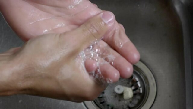 Proper hand washing to remove dirt and viruses from the skin - close up
