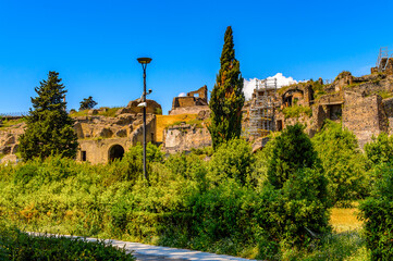It's Ruins of Pompeii, an ancient Roman town destroyed by the volcano Vesuvius. UNESCO World...