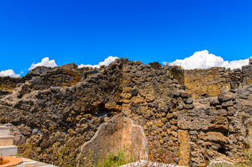 It's RUins of Pompeii, an ancient Roman town destroyed by the volcano Vesuvius. UNESCO World Heritage site