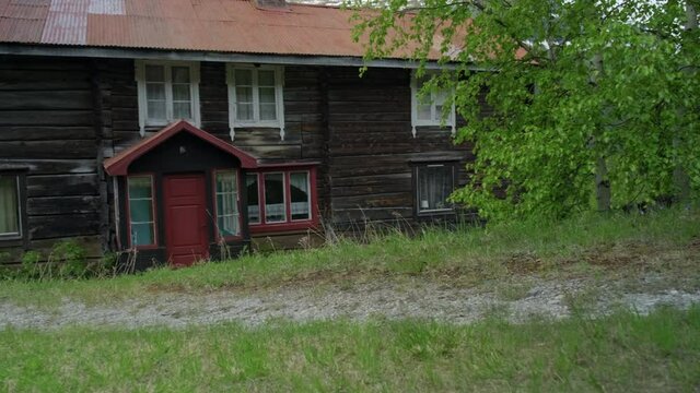 Old beautiful farm in a secluded countryside with mountains behing
