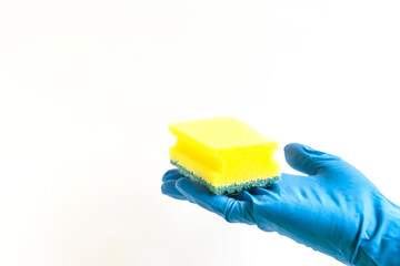 Blue glove for cleaning with yellow sponge. Isolated on a white background.