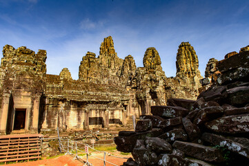 It's Bayon, Khmer temple at Angkor in Cambodia. Official state temple of the Mahayana Buddhist King Jayavarman VII