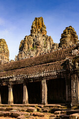 It's Bayon, Khmer temple at Angkor in Cambodia. Official state temple of the Mahayana Buddhist King Jayavarman VII