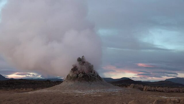 Iceland. Eruption of fumarole on a geothermal field.