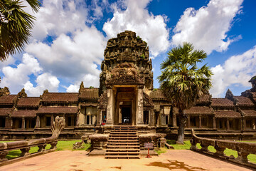 Naklejka premium It's Angkor Wat (Temple City), a Buddhist, temple complex in Cambodia and the largest religious monument in the world. View from the garden
