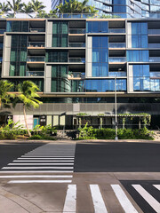 Crosswalks and new condominium at the intersection in Kakaako, Honolulu, Oahu Island, Hawaii