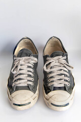 sneakers dirty isolated on white background, Footwear for outdoor activities,
