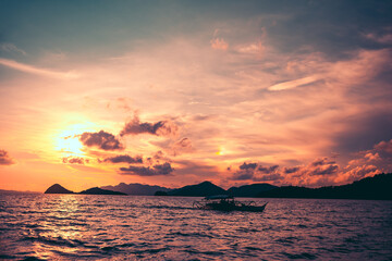 Cruising the seas of Coron, Palawan at sunset