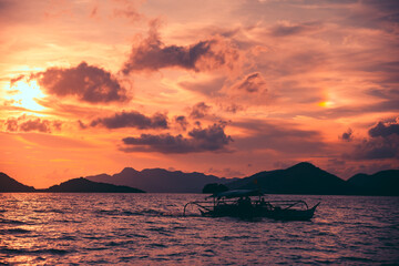 Cruising the seas of Coron, Palawan at sunset