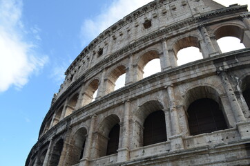 Amazing view of the Building  of roman building of the Roman Coliseum with blue cloudy sky