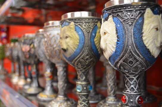 Wine glasses on display with wolf sign like the medieval times depicting the house of Stark of game of thrones