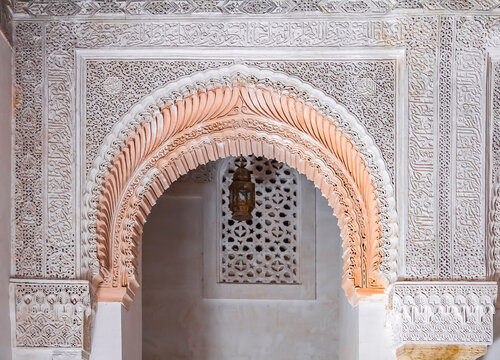 Moroccan Carved Plaster Arabesque in the 14th century  El Attarine Medersa built by the Marinid sultan Uthman II Abu Said in 1323 in Fes. Morocco