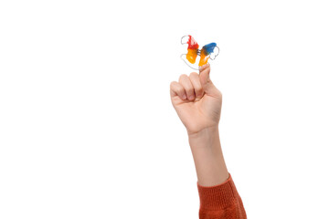 Child's hand with orthodontic appliance on a white background