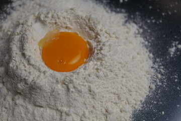 egg yolk on flour